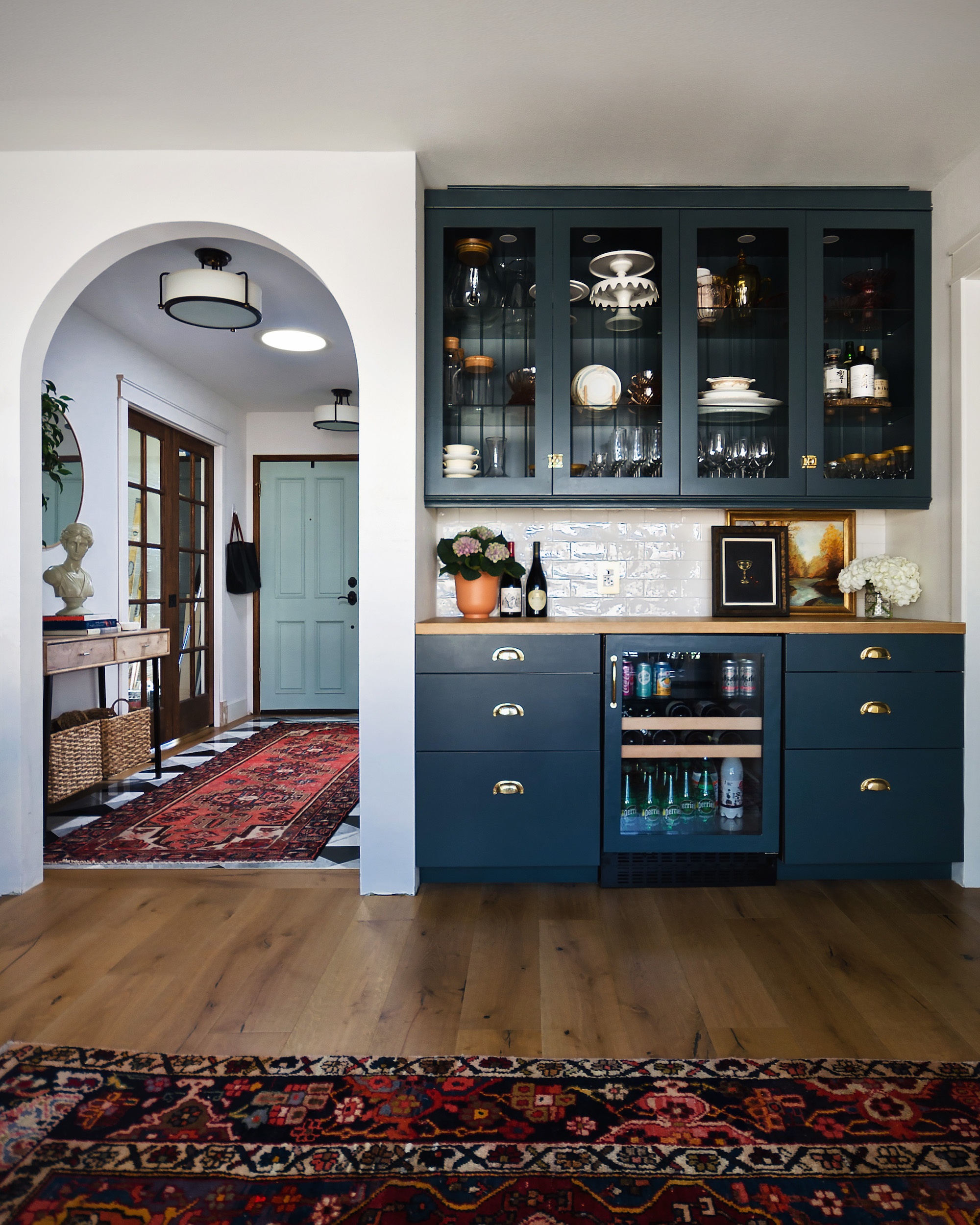 Kitchen Archway with Navy Blue Bar Cabinets