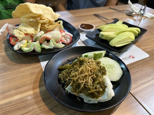 Clockwise from upper right: rujak mangga, teri cabe ijo, and crackers potpourri