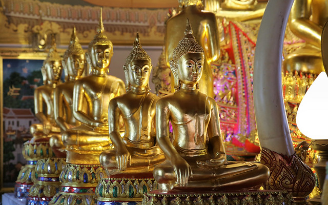 Experiencing the beauty and spirituality of Buddha statues in Wat Intharawihan