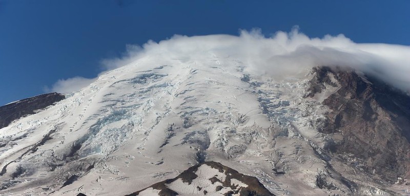 Zoomed-in view of cloud-shrouded Mount Rainier with icy Emmons Glacier, from the Sunrise Rim Trail