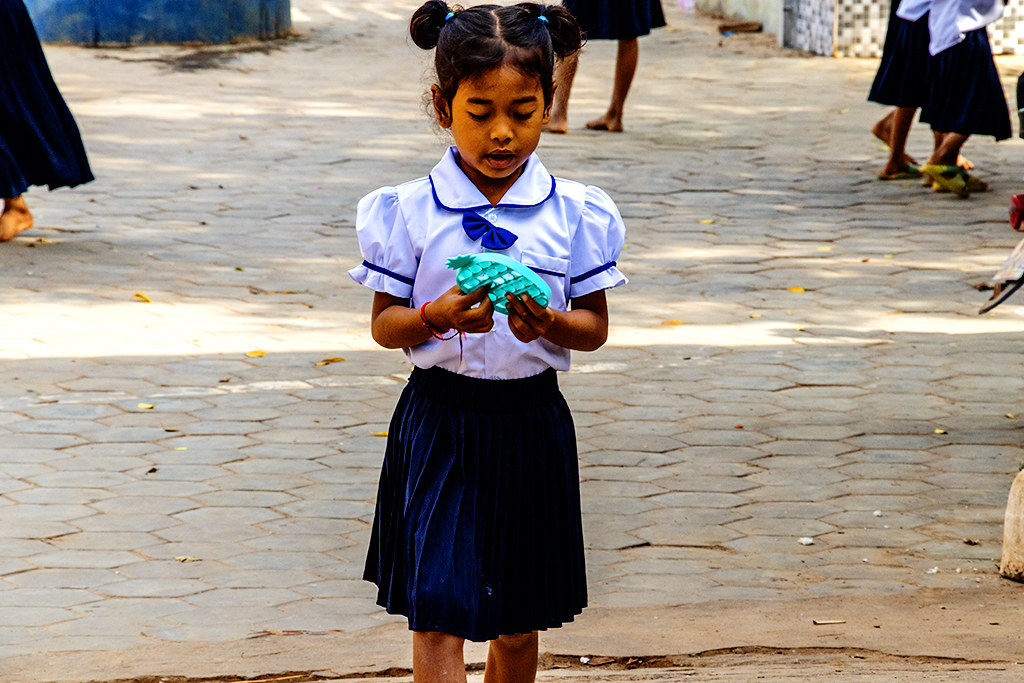 Little girl during recess at Phnom Krom Suwon Primary School on 1-31-23--Phnom Krom copy