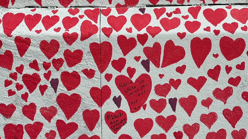 Red hearts on a wall - part of the covid memorialisation wall in London