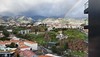 Madeira 2023 - View of Funchal with rainbow and the surrounding hills