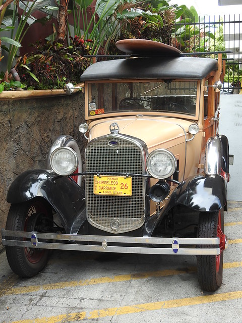 1930 Ford Woodie with surfboard