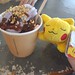 Sleeping Pikachu plush toy eating a yoghurt dessert at Yougurberry 😋🍨