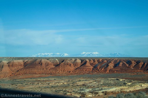 The La Sal Mountains across red badlands from the Hans Flat Road, Maze District, Canyonlands National Park, Utah