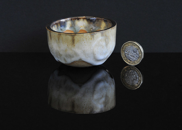 Mini bonsai pot with Shino type glaze and Metallic Rim made by Steve Greaves.