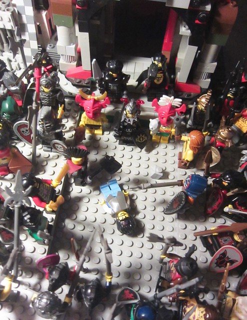 Classic castle: Barbarian horde interrogating a captured soldier from the Slavic-Nordic faction as he is considered a traitor the harsh treatment is even worse than other captured factions troops (AFOL LEGO Vignette with fantasy/medieval Minifigures)