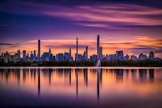 Reflection of Central Park South skyline in the Jacqueline Kennedy Onassis Reservoir in Central Park, Manhattan, New York City