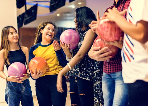 A group of students bowling 