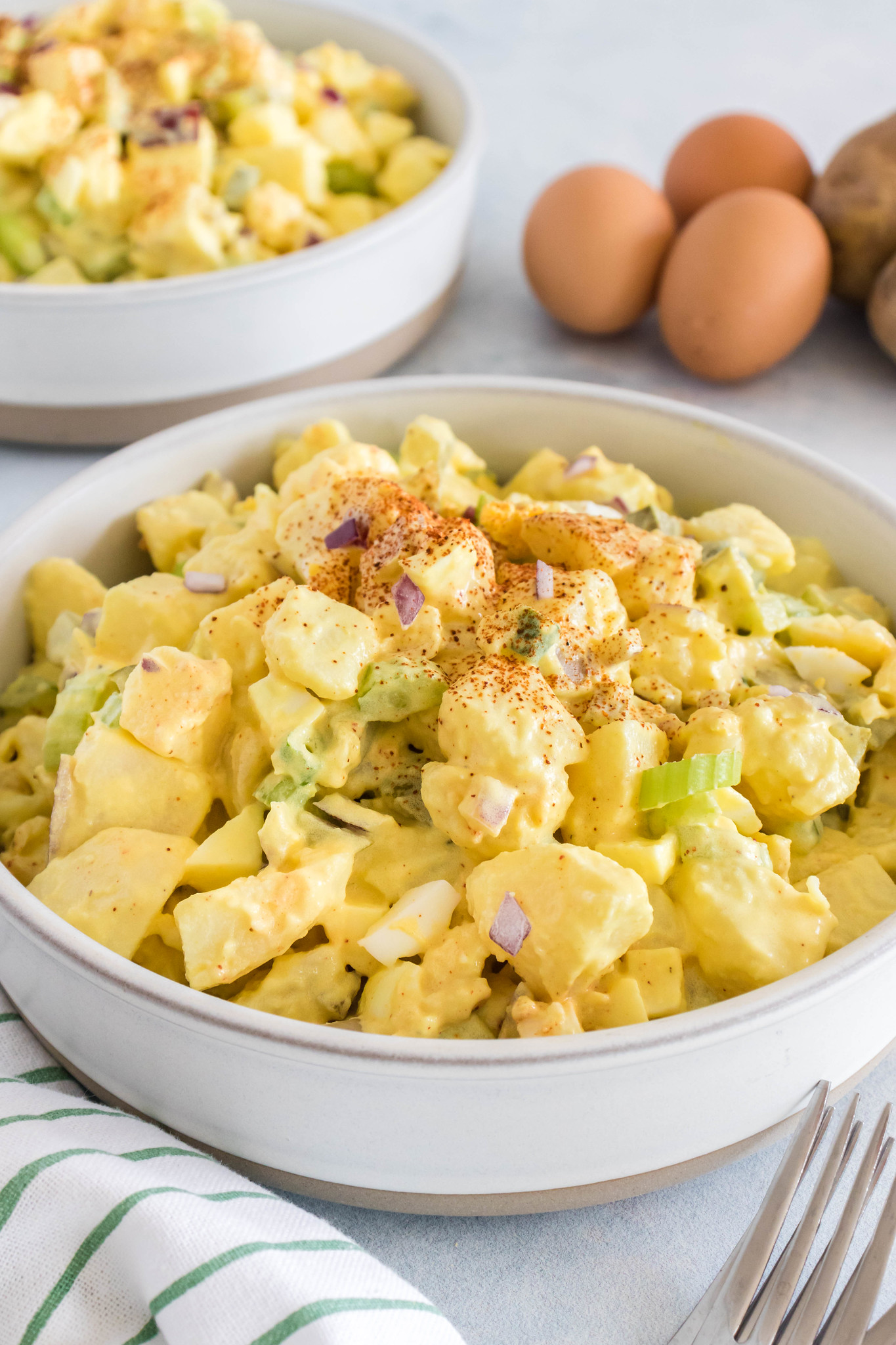 Classic southern potato salad in a white bowl