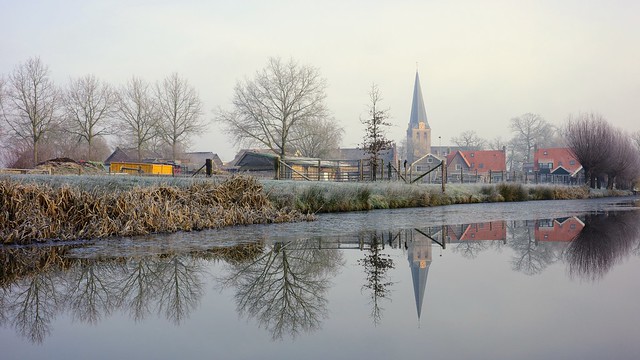 Old village in reflection