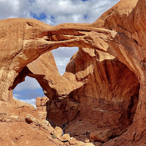 archesnationalpark moab utah sky geology arch shadow clouds outdoors sunlight