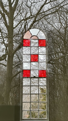 iphone14pro reflection window rhodeisland stainedglass vertical