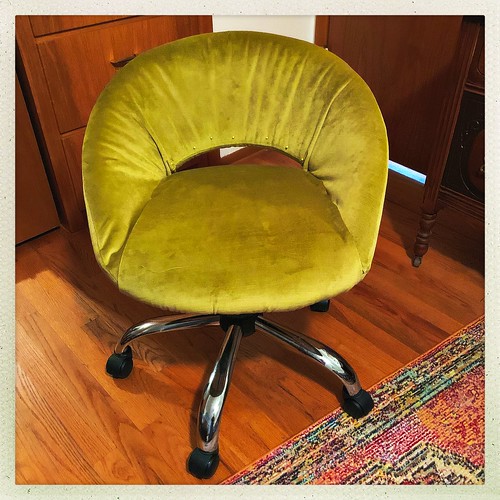 Reupholstered Swivel Chair