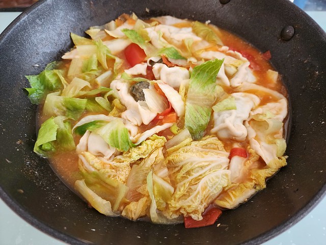 Aunt Lee Geok's beef chive cats-ears dumpling in Julia's kimchi hotpot