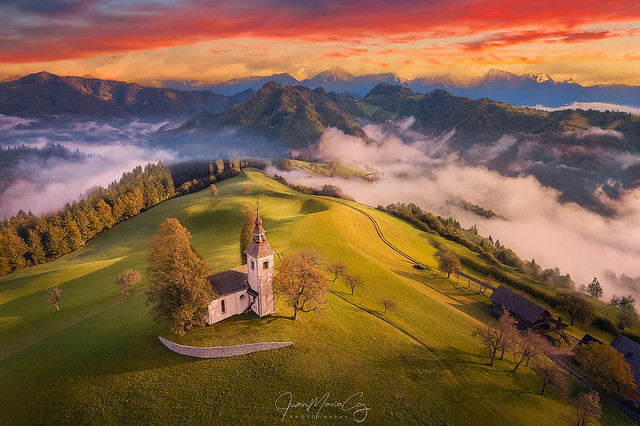 Magical foggy Morning over St. Thomas Church in Slovenia - Škofja Loka (Slovenia)