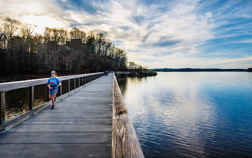 Lakeside Run by Sky Noir, Crabtree Lake is a beautiful and serene lake located in Cary, North Carolina. It is a man-made lake 