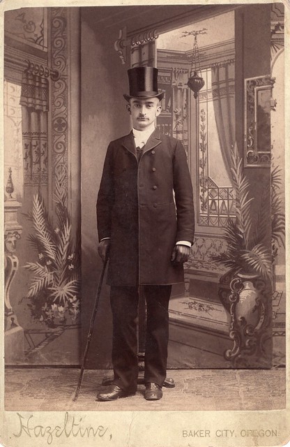 Cabinet Photo_full-length portrait of man in suit, top hat, gloves and cane, Baker City, Oregon