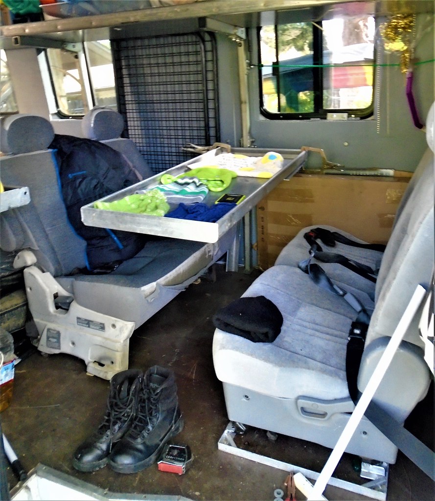 Sprinter dinette with 2nd & 3rd seat rows with fold-up table