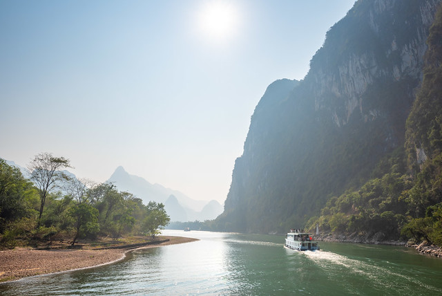 Li River cruise with limestone karst hills landscape in China