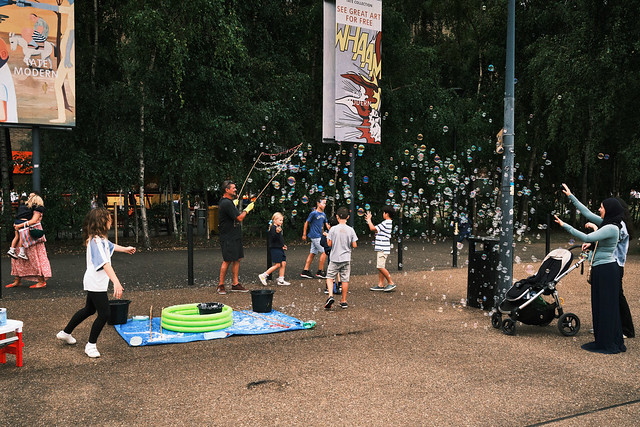 Playing with soap bubbles 2 - Tate Modern Garden, London