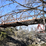 Derelict North Bosque River Bridge (Erath County, Texas) Historic abandoned Pratt pony truss bridge over the North Bosque River in Erath County, Texas.  