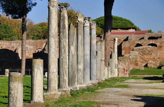 Corinthian colonnade and forum ruins, Ostia Antica archaeological park, Rome..