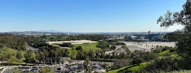 A top view of the continuous East Los Angeles facing Elysian Park, Dodger Stadium, Solano Canyon, Lincoln Heights, El Sereno, Boyle Heights, Hollenbeck, San Gabriel Valley, Vernon, Huntington Park and Southeastern Los Angeles and Downtown Los Angeles