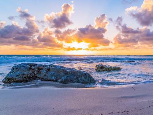 cancun sunrise beach ocean rocks clouds mexico