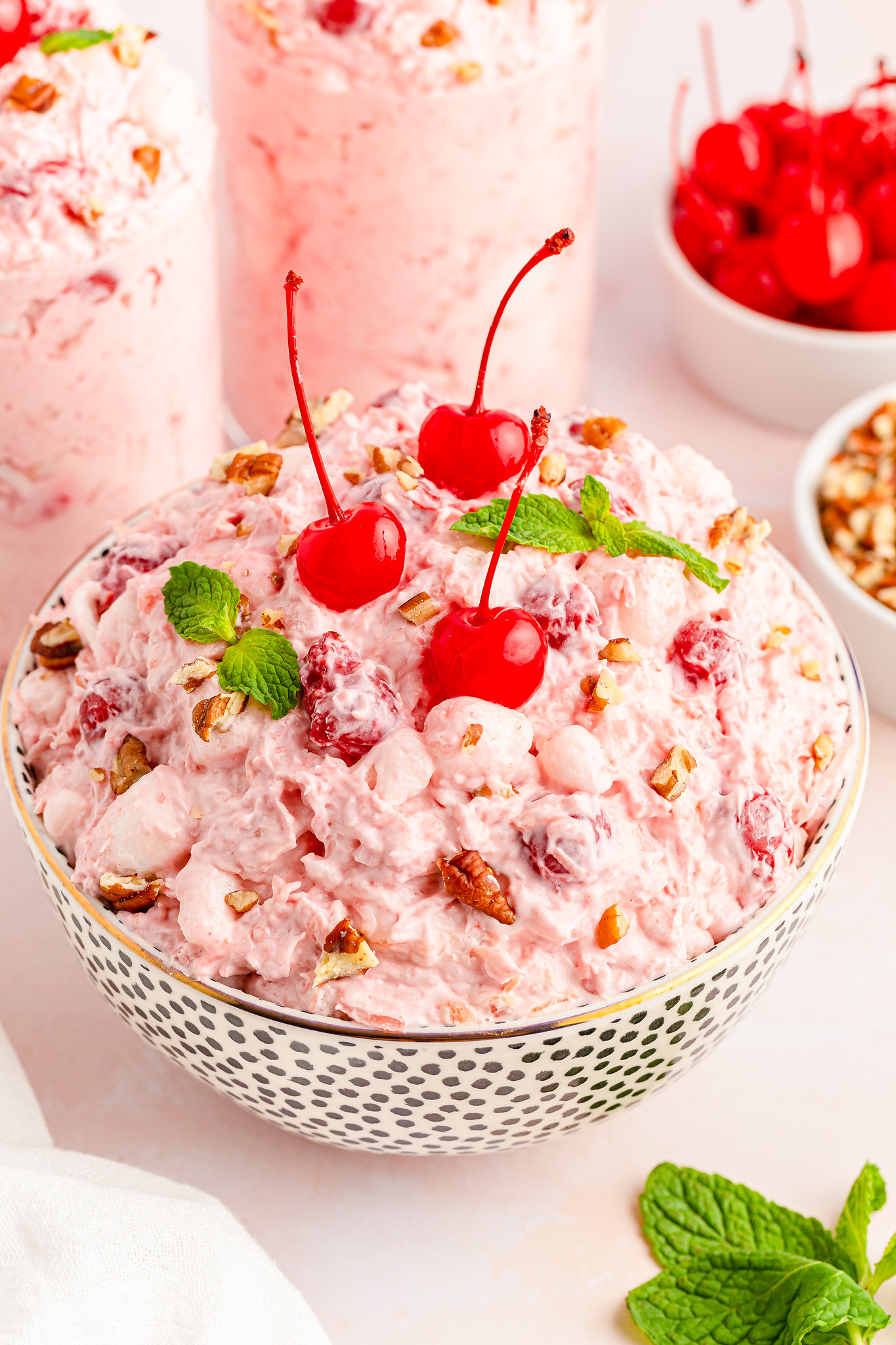 Cherry Fluff is a fluffy fruit salad made with cherry pie filling, marshmallows, coconut, and nuts. The perfect no bake summer dessert!
