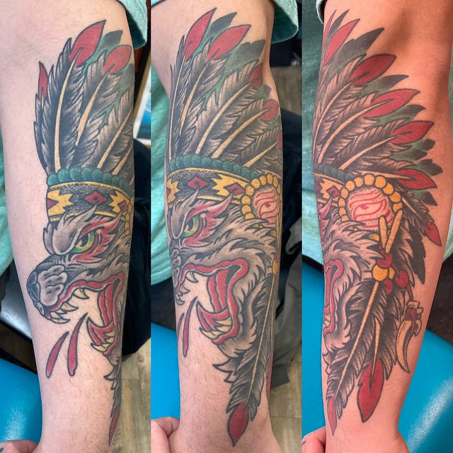Healed wolf heritage tattoo