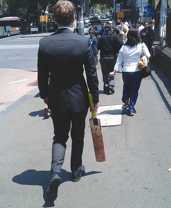 Man carrying a cricket bat to work (February 2013)