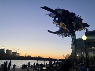 Scarlet, modern sculpture at Washington Harbour, Potomac River at sunset, Washington, D.C.