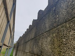 Gap in east wall