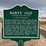 Nanty Glo historical sign Glo was incorporated as a Cambria County Borough. 
 Education evolved from a one room school house to the four year high school program still in operation as the Blacklick Valley School System.

In March 2005 twenty years of effort to begin cleanup of acid mine drainage from the Webster Mine into the South Branch of the Blacklick Creek culminated with the installation of a large ecosystem restoration system. Reclamation of the waste coal or
&amp;quot;boney piles&amp;quot; along the creek is
also underway. This project will eliminate dangerous contaminants leaching into the stream.

Ghost Town Trail @ Nanty Glo, Pennsylvania