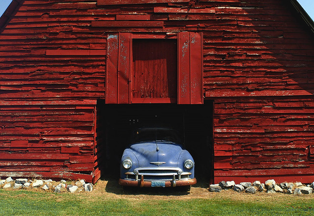 Blue Chevy, red barn