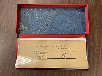 Clamshell box which holds the paper