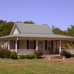 Jesse Owens Museum building - Danville, AL This building is on the grounds of the Jesse Owens Museum in Danville, AL.  No info was provided, so it may have been the original museum building on the early 1980s or a welcome center.  It is also the closest building to the street where a more elaborate building has opened further to the left.

My grandfather was a competitive jogger and athlete.  He had huge admiration for Jesse Owens and everything he accomplished.