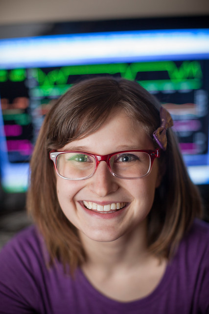 TRAD student headshot in front of computer screen