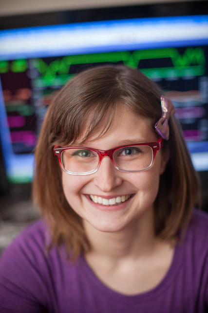 TRAD student headshot in front of computer screen