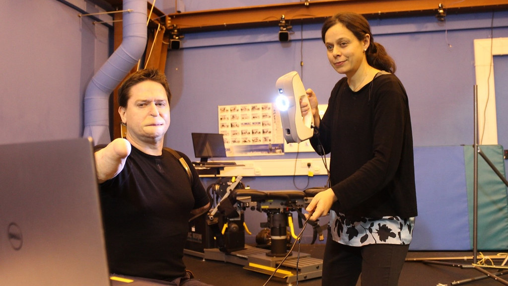Quadruple amputee, Alex Lewis, with Dr Elena Seminati in the Department for Health's Applied Biomechanics Suite.