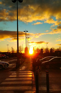 sunset in the supermarket carpark