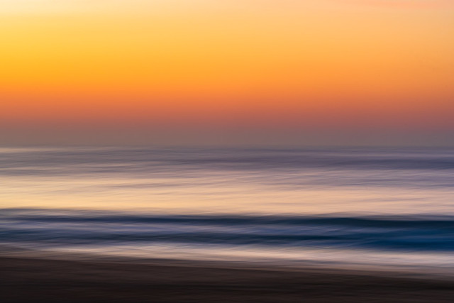 Soft and silky abstract sunrise at the seaside
