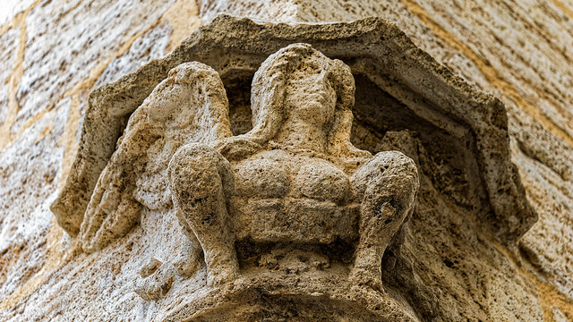 Eroded Stone Figure - Building - Palace of the Generalitat (Valencian Government Building) (Olympus OM-1 & Panasonic 35-100mm f2.8 Telephoto Lens)