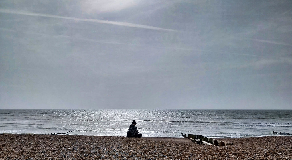 The man in the bobble hat (and accompanying groynes)