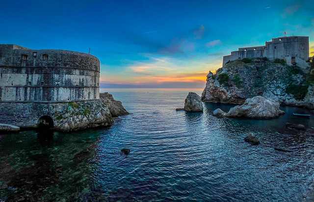 Fort Bokar and Fort Lovrijenac with the West Harbor Bay at dusk - Dubrovnik Croatia