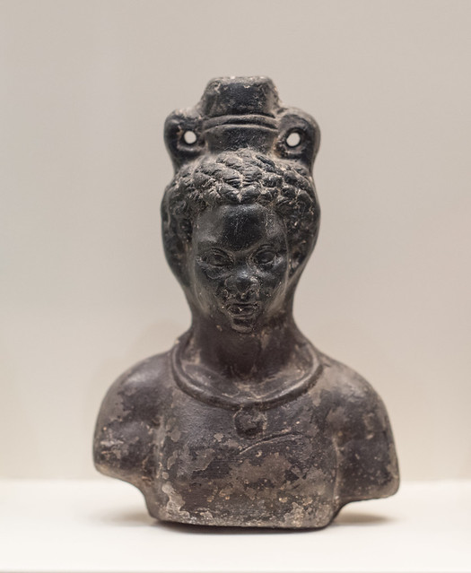 Terracotta balsamarium in the form of a young man