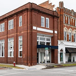 Former Bank of Onslow & Masonic Temple, Jacksonville, North Carolina, United States &amp;quot;The Bank of Onslow and the Jacksonville Masonic Temple are two adjoining historic buildings located at 214 and 216 Old Bridge Street, in Jacksonville, Onslow County, North Carolina. The buildings are in the Beaux Arts architecture and Tudor Revival architecture, and were constructed in 1916, and 1919 respectively. They were jointly listed on the National Register of Historic Places in 1989 as a national historic district.

The Masonic Temple was originally constructed by La Fayette Lodge No. 83, A. F. &amp;amp; A. M. and served as their meeting hall until 1955 (when the lodge moved to new premises). It is currently used as office space by the town government.

Jacksonville is a city in Onslow County, North Carolina, United States. As of the 2020 United States census, the population was 72,723, which makes Jacksonville the 14th-largest city in North Carolina. Jacksonville is the county seat and most populous community of Onslow County, which is coterminous with the Jacksonville, North Carolina metropolitan area. Demographically, Jacksonville is the youngest city in the United States, with an average age of 22.8 years old, which can be attributed to the large military presence. The low age may also be in part due to the population drastically going up over the past 80 years, from 783 in the 1930 census to 72,876 in the 2021 Census estimate.

It is the home of the United States Marine Corps&#039; Camp Lejeune and New River Air Station. Jacksonville is located adjacent to North Carolina&#039;s Crystal Coast area.&amp;quot; - info from Wikipedia. 

The fall of 2022 I did my 3rd major cycling tour. I began my adventure in Montreal, Canada and finished in Savannah, GA. This tour took me through the oldest parts of Quebec and the 13 original US states. During this adventure I cycled 7,126 km over the course of 2.5 months and took more than 68,000 photos. As with my previous tours, a major focus was to photograph historic architecture. 

Now on &lt;a href=&quot;https://www.instagram.com/billyd.wilson/&quot; rel=&quot;noreferrer nofollow&quot;&gt;Instagram&lt;/a&gt;.

Become a patron to my photography on &lt;a href=&quot;https://www.patreon.com/billywilson&quot; rel=&quot;noreferrer nofollow&quot;&gt;Patreon&lt;/a&gt; or &lt;a href=&quot;https://www.paypal.com/cgi-bin/webscr?cmd=_s-xclick&amp;amp;hosted_button_id=E74U8G8TZKYDJ&quot; rel=&quot;noreferrer nofollow&quot;&gt;donate&lt;/a&gt;.