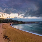 8. Veebruar 2023 - 6:10 - Sunrise with rain clouds at Putty Beach on the Central Coast, NSW, Australia.